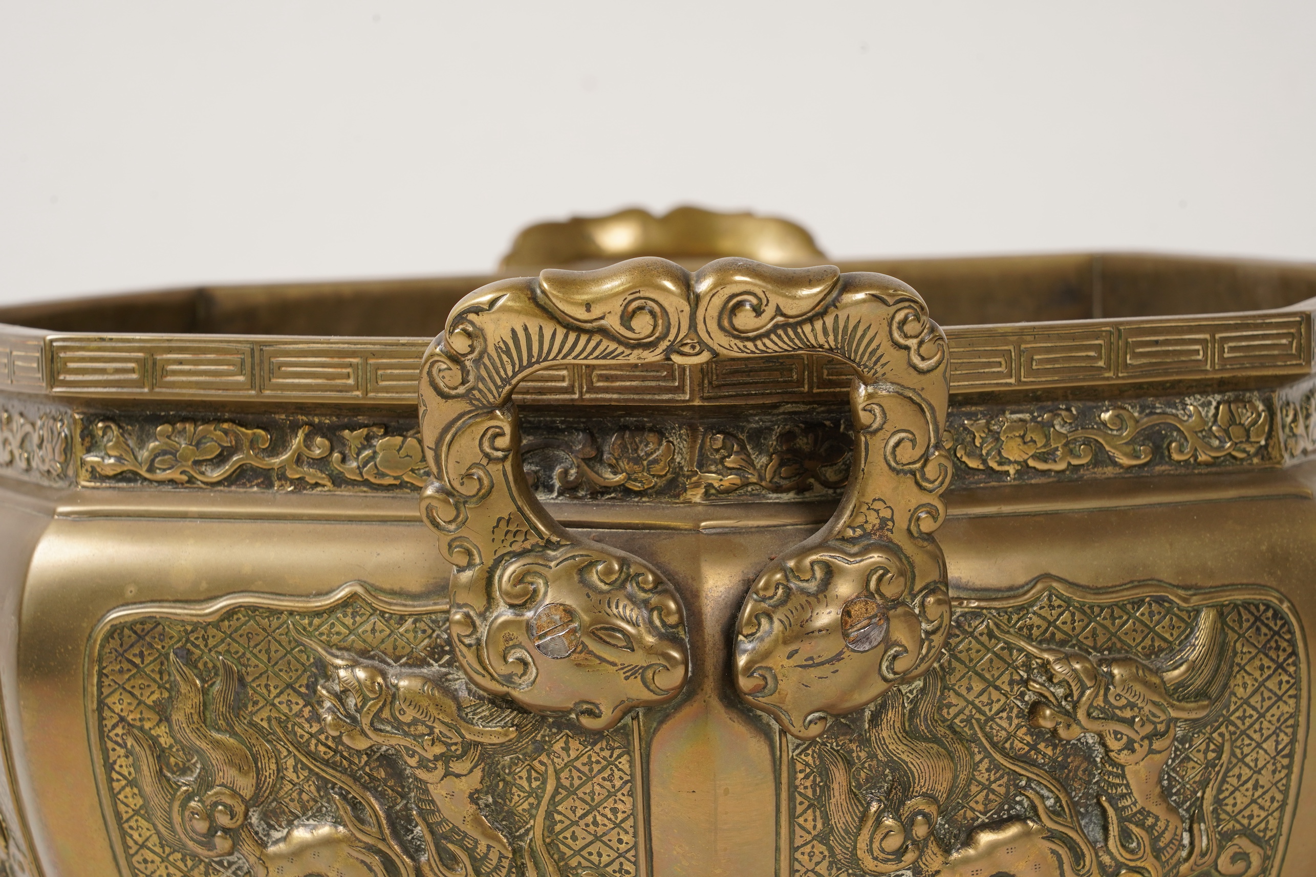 A large Chinese or Japanese bronze octagonal jardiniere, 19th century